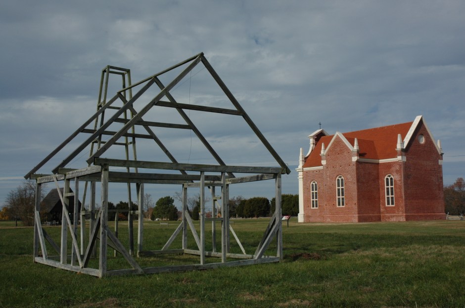 Reconstruction of the 1667 brick chapel, with the "ghost frame" of an unknown building in the foreground. Photo: Margaret Yocom, 2013.