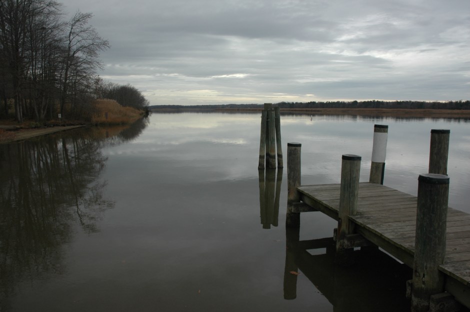 Looking upstream from the boat ramp, toward the site of the Magruder warehouse. Photo: Margaret Yocom, 2013.