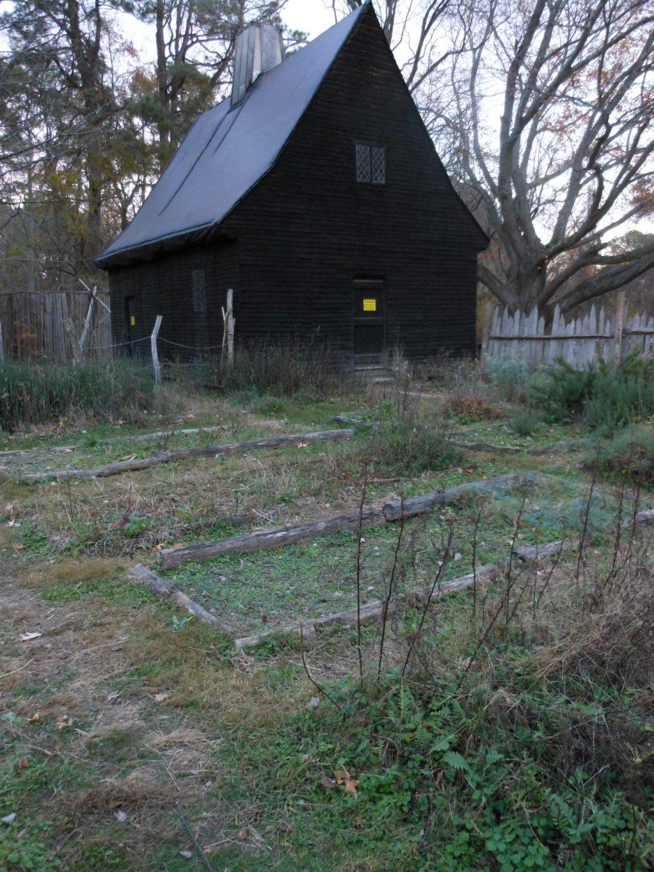 House and kitchen garden at Godiah Spray Plantation, Historic St. Mary's City, at twilight. Photo: Margaret Yocom, 2013